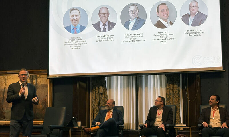 Peter Svach moderating a private markets panel at a Carmo Companies event